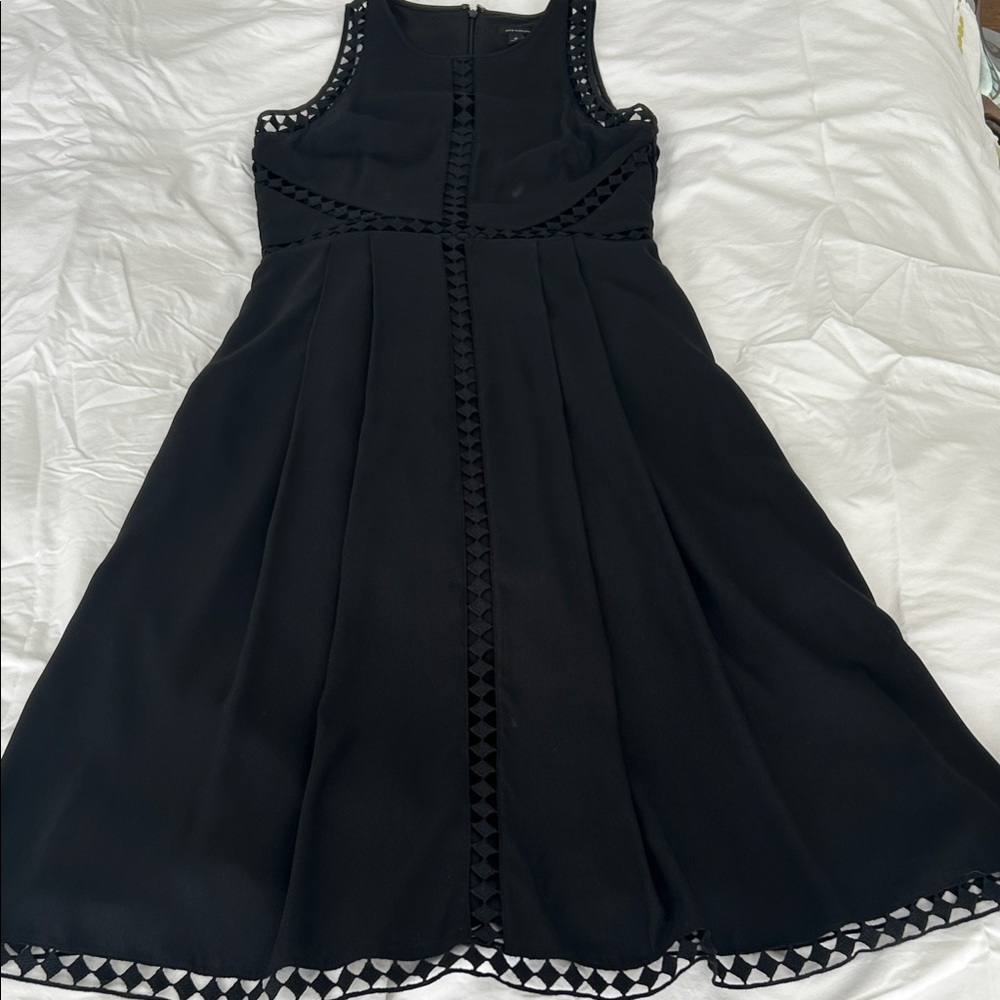 Elegant Black Woman’s Sleeveless Dress